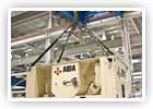One of AIDA's 100 U.S. tons cranes lifting a press crown