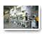 NC1 C-Gestell-Presse mit einem Druckpunkt in einer Transfer Linie mit Inter-Pressen Transfer Roboter A8II