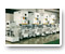 NC1 Mit einem Druckpunkt C-Gestell-Presse in einer Transfer Linie mit Inter-Pressen Transfer Roboter NCTHL